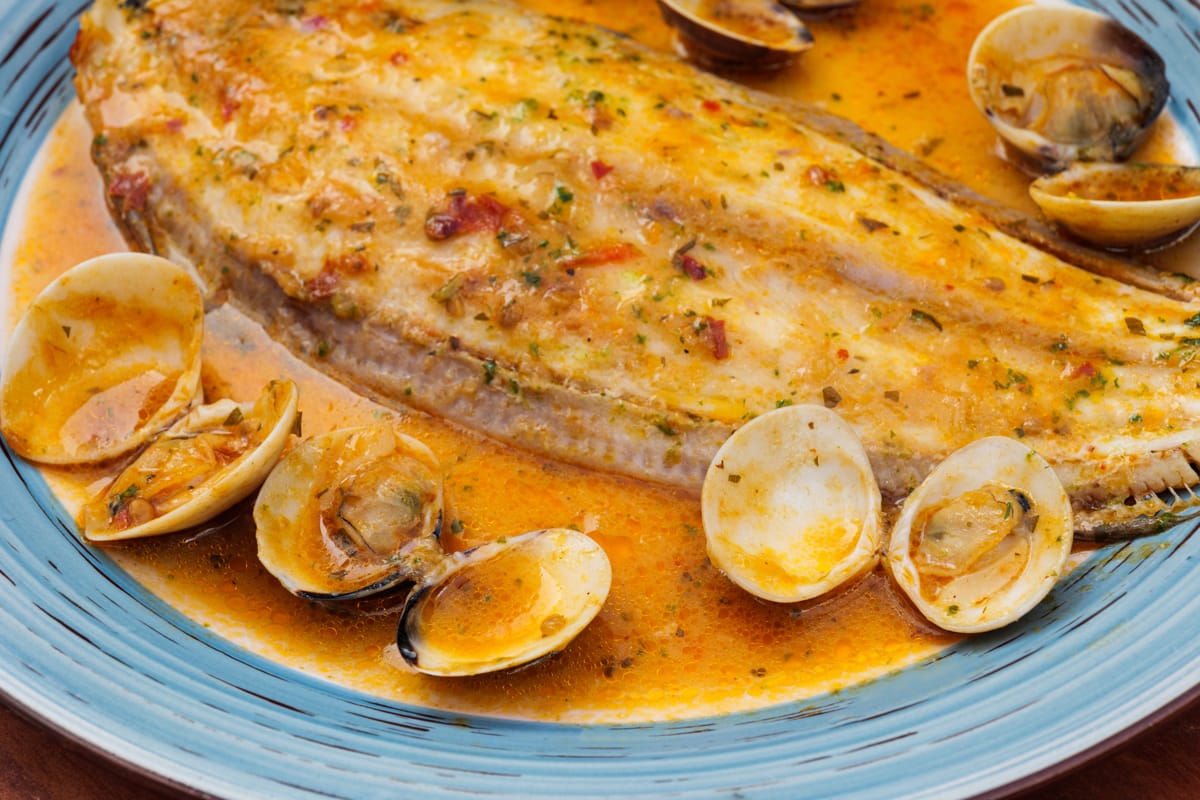 Fish with clams in sauce